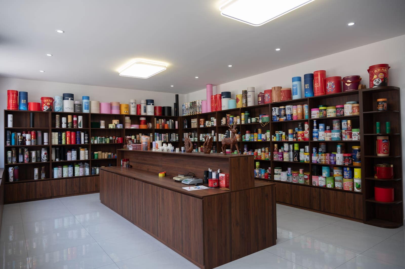 Showroom shelves filled with custom paper tube packaging samples